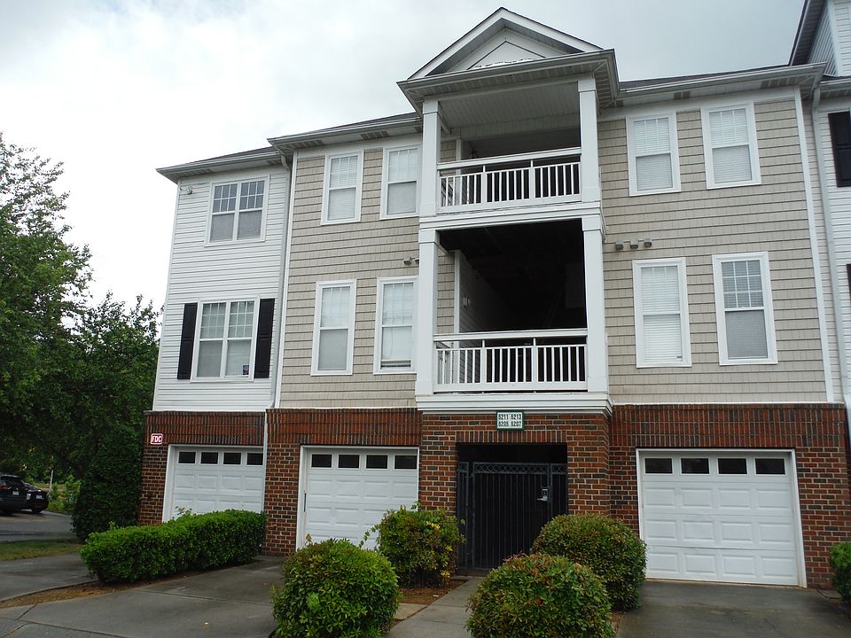 Front exterior, secured entry and one car garage