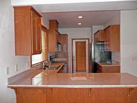 Kitchen, opens to back yard, pantry