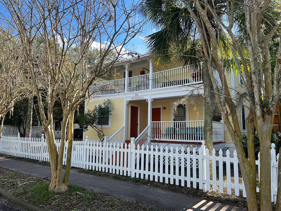 Apartment number one is on the first floor (left door) with a front porch.