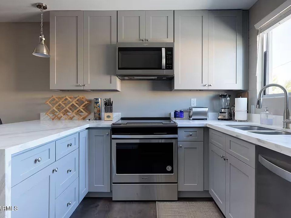 1st image of 6936 E 4TH Street #18