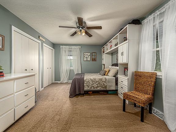 Master bedroom, camera facing South
Queen-size cabinet/shelf unit and white dresser optional included furnishing
