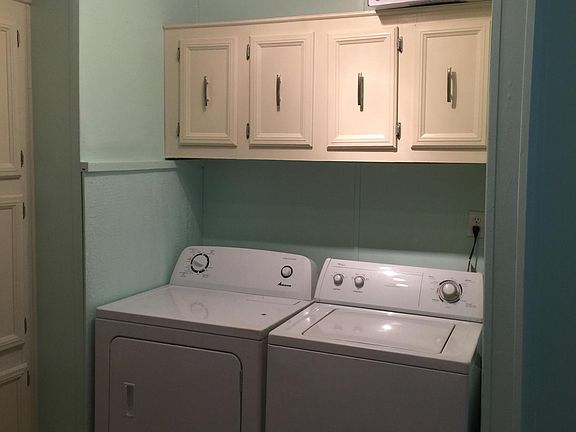 washer, dryer, more kitchen cabinets