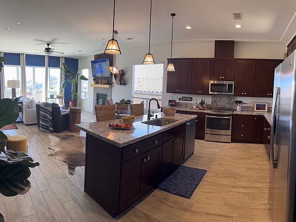 Kitchen and living room with ocean views and open floor plan