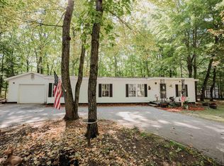 8755 Vagabond Ln, Interlochen, MI 49643