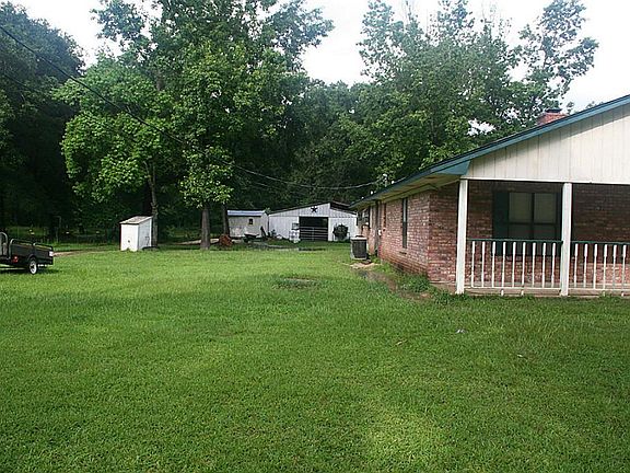 Full length covered porch. See the barn in the back