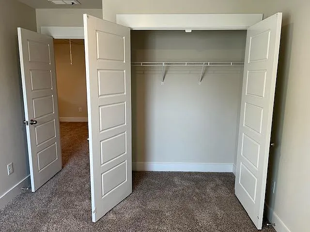 3rd bedroom closet and french doors