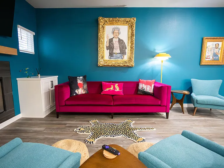 Artwork and TVs are included. Attached to the living room is a walk in pantry