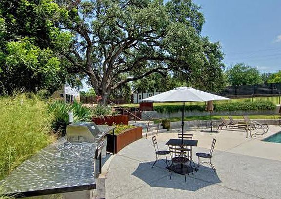 Community pool + large grill for hosting parties