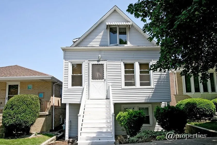 5303 S Mulligan Ave photo 1