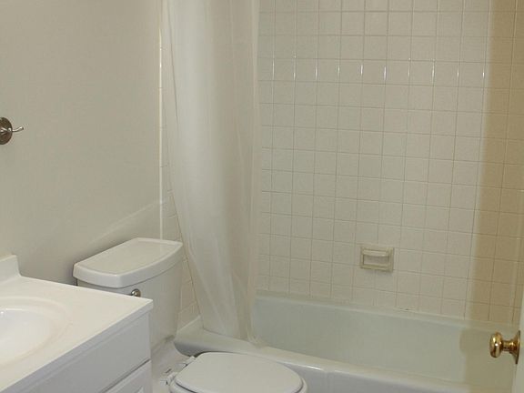 Tiled bath/shower surround and flooring