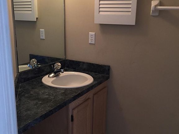 downstair's half bath (Mirror and lighting to be updated)