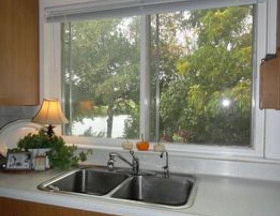 Inside from the kitchen sink, you can fill up that coffee pot every morning and start your day while overlooking this serene beautiful eye catching view!