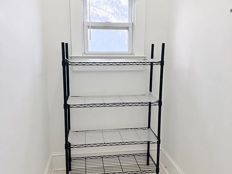 Large Pantry off Kitchen with Stairs to Basement