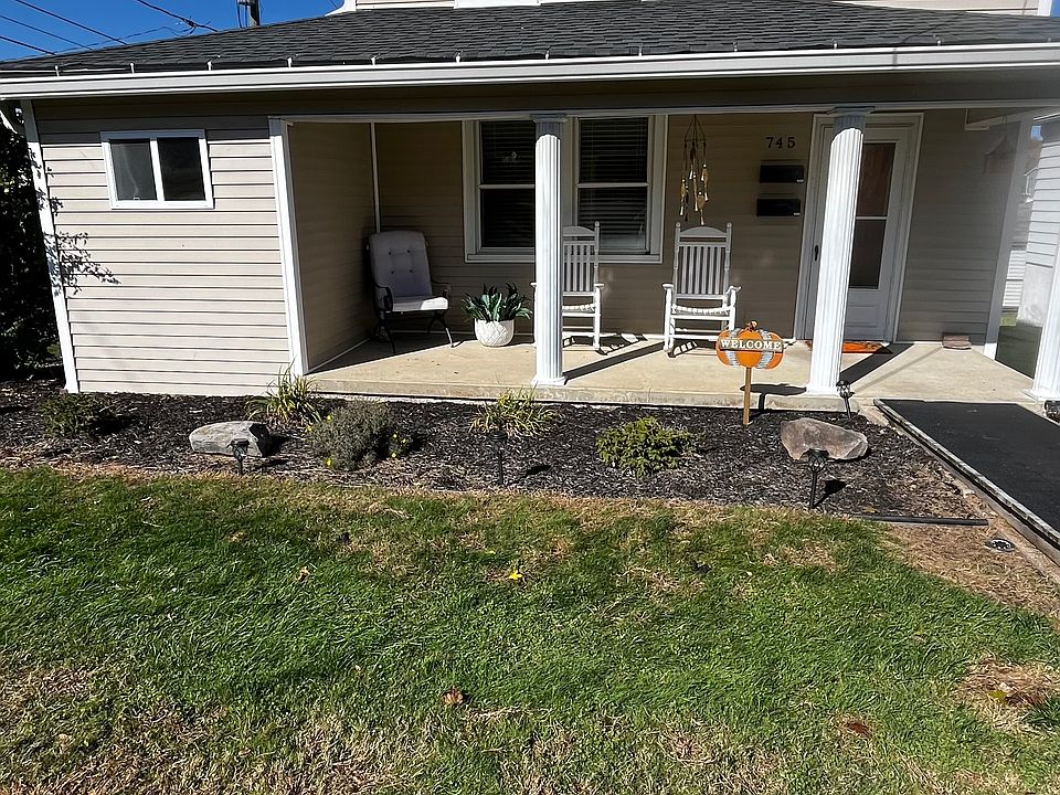 Outside of the home- unit for rent is the bottom floor.