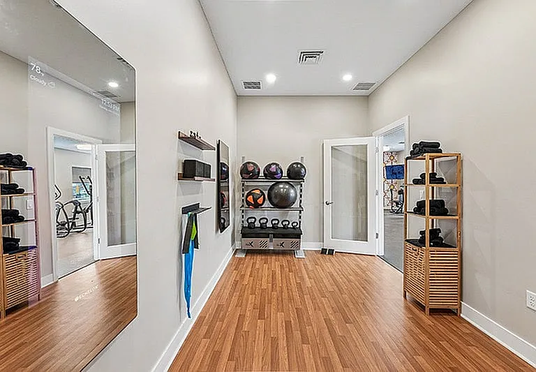 Enjoy the peaceful ambiance in our private yoga studio with Eschelon mirrors.