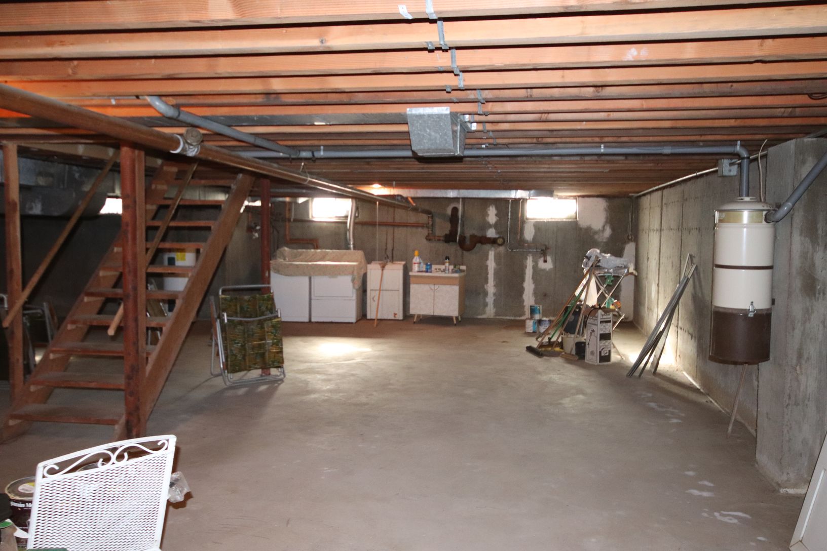  Basement with 2 hot water heaters and oil boiler