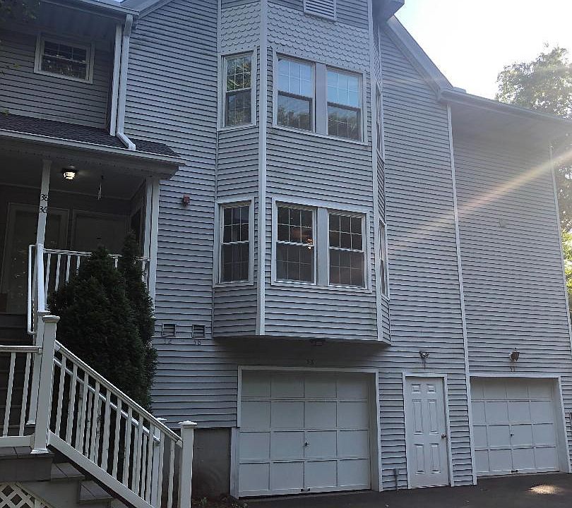 Front of complex. Unit is directly above garages on second floor.