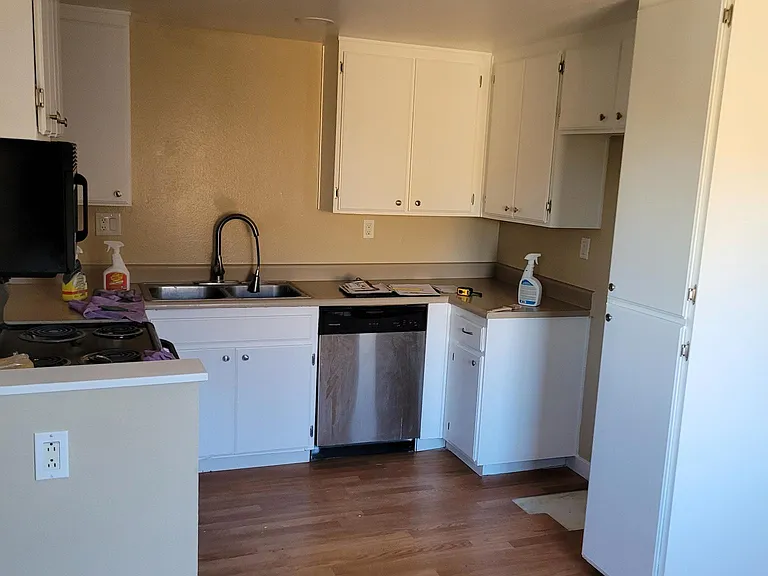 Kitchen prior to new stainless fridge installed