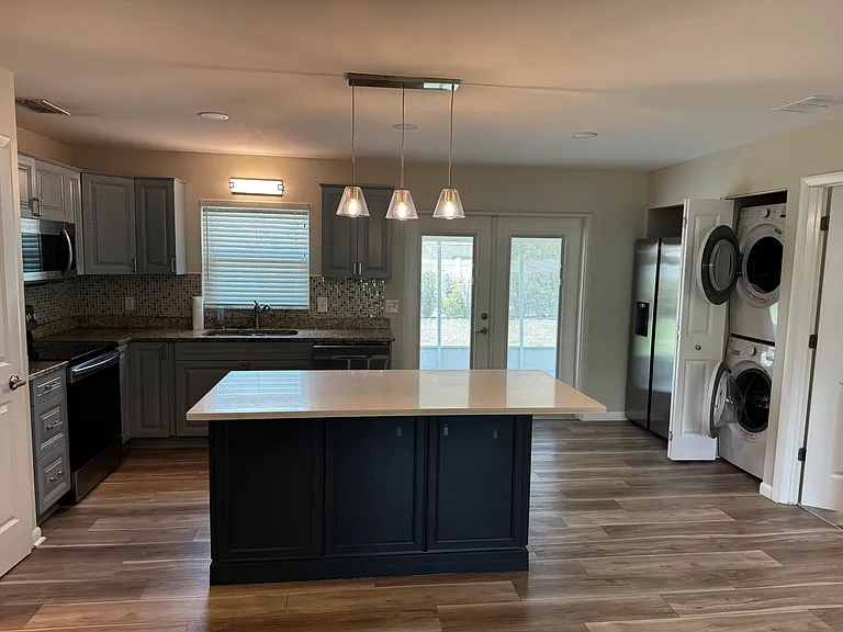 Open concept kitchen and living room