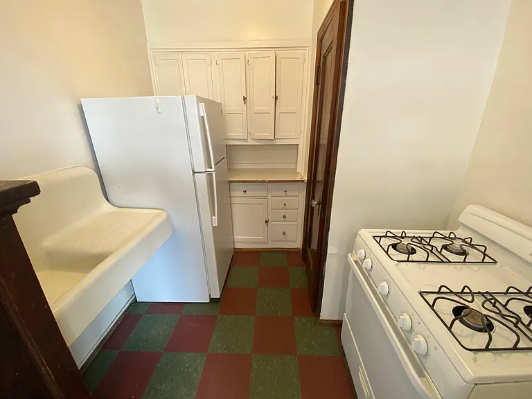 Kitchen includes appliances and lots of storage space.