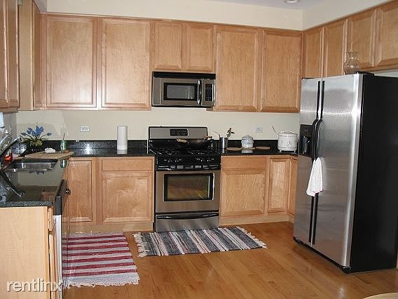 2nd image of 6120 W 65th St Unit 1