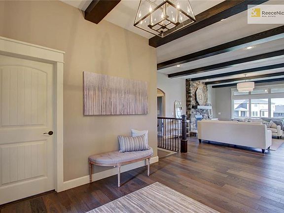 Open floor plan throughout with wide plank hardwood flooring.