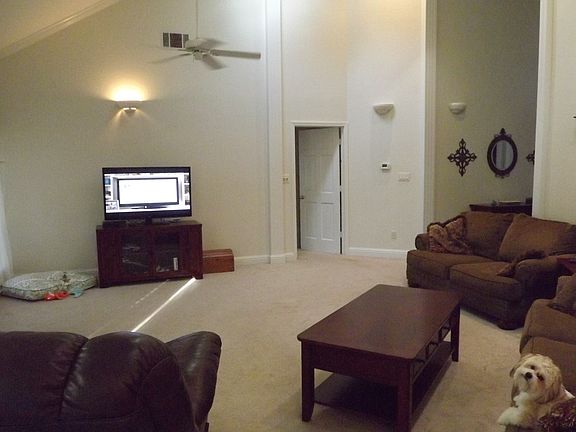 Living Room w/ vaulted ceil