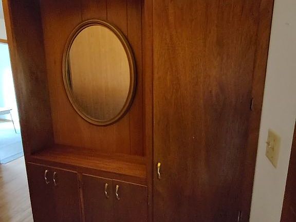 Divides living rm from entry