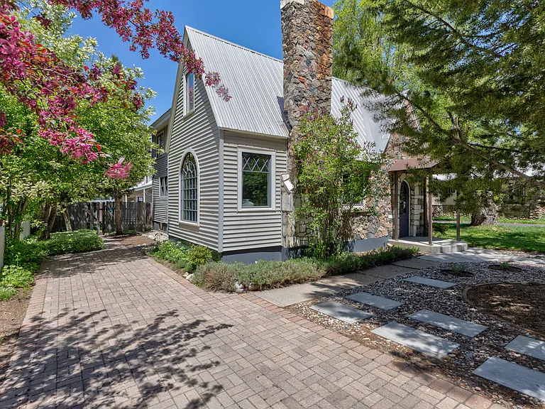 Exterior of home with driveway for parking 2 vehicles