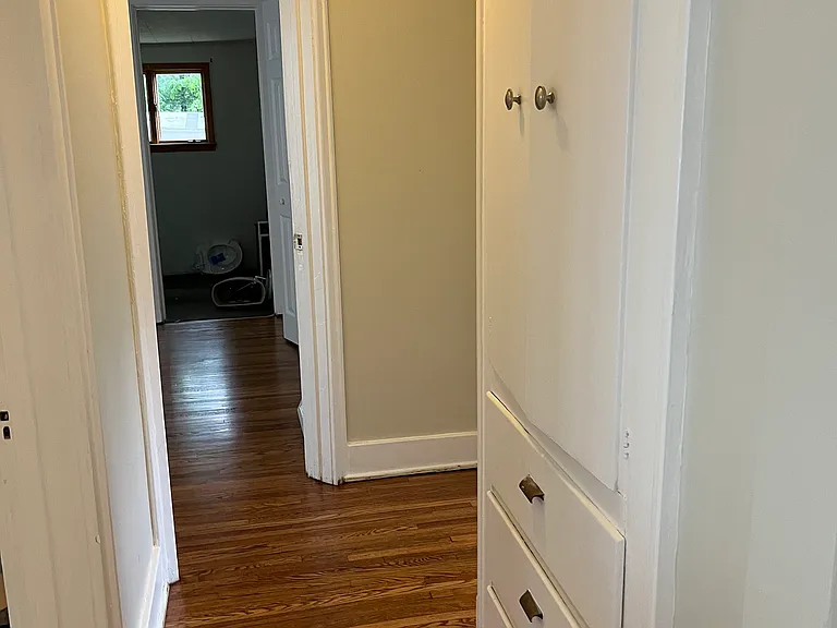 Hallway to back bedrooms
