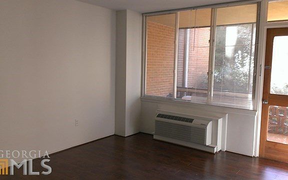Another look at the dining room with screened in porch.