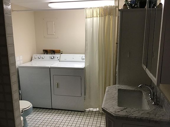Bathroom with washer and dryer
