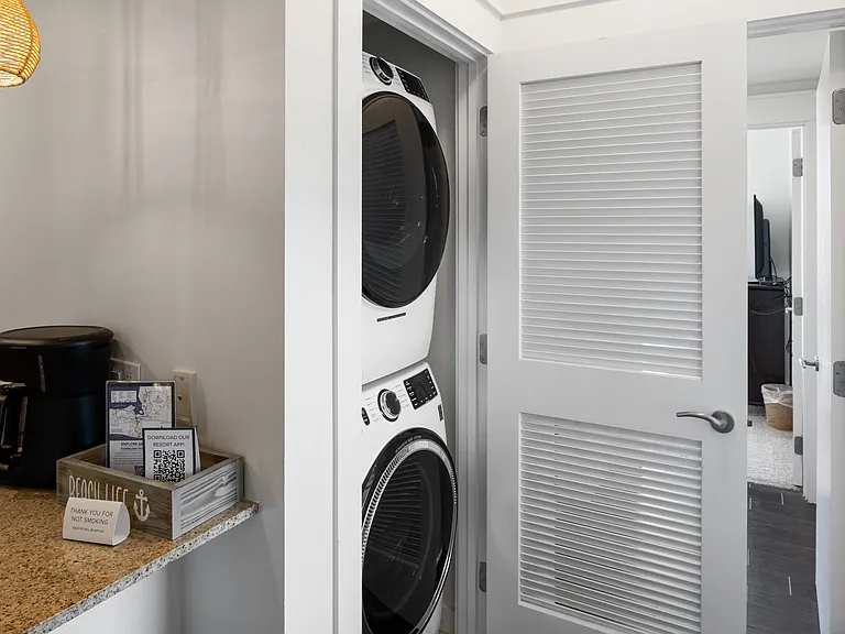 Laundry closet off kitchen