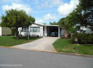 715 Gladiolus Dr, Barefoot Bay, FL 32976