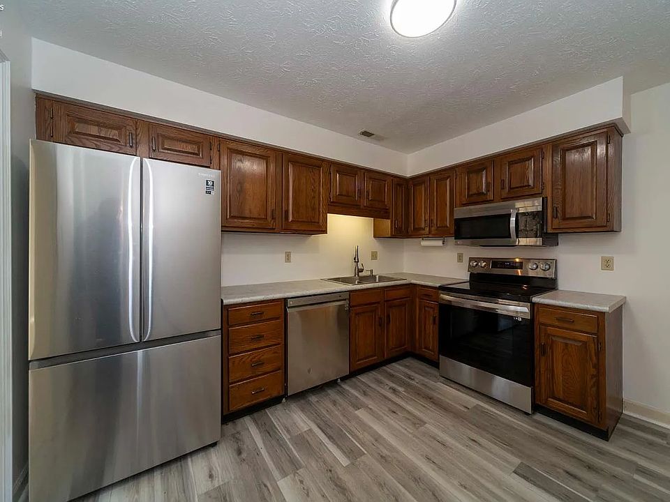 Kitchen appliances include dishwasher and built in microwave
