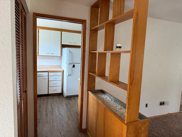 family room off of kitchen with built-ins
