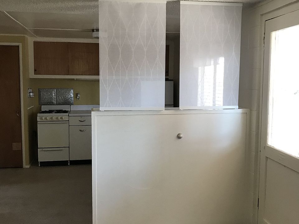 View from Living area to Kitchen. New paint throughout.