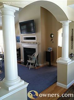 Columned Front Entry View of Living Room