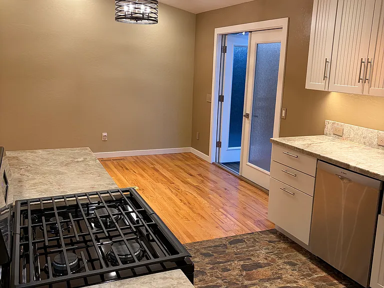 Dining area and french doors to backyard
