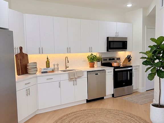 Virtually staged to help show possible furniture layout and use of space.
