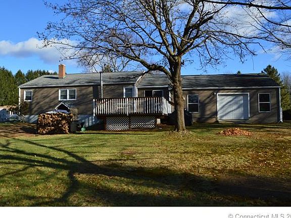 Large, level yard is fenced...