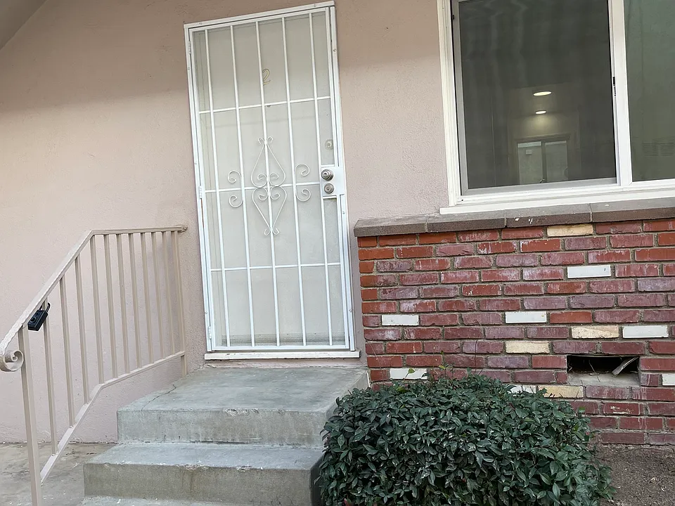 Back downstairs unit 2. Updated exterior windows. Newer security screen door.