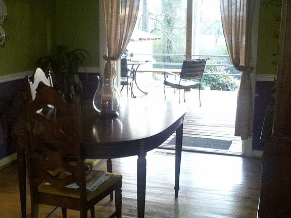 Dining room leading out to deck through french doors.