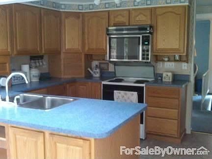 Kitchen
						:
						Modern kitchen, oak cupboards