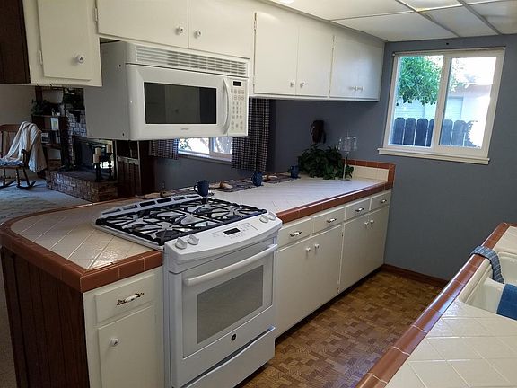 Gas range and built-in microwave.