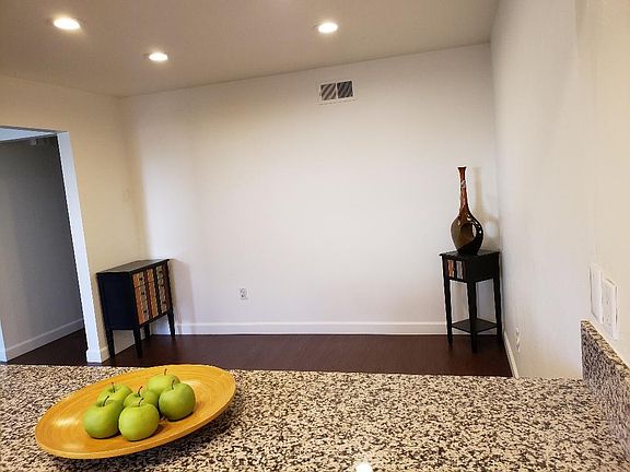 a spacious dining area off teh kitchen