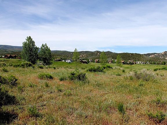 VIEW FROM EAST SIDE OF LOT TOWARDS 16TH FAIRWAY SHOWING FLATNESS OF BUILDING ENVELOPE