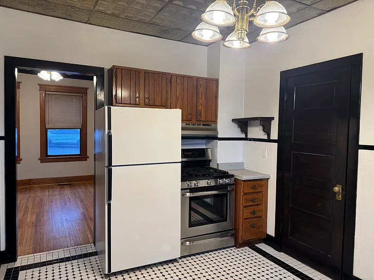 kitchen leading into dining room