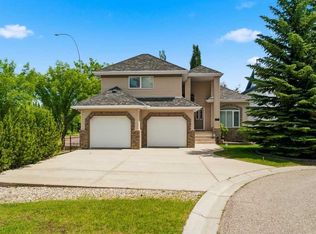 545 W Rocky Ridge Bay NW, Calgary, AB T3G4E7