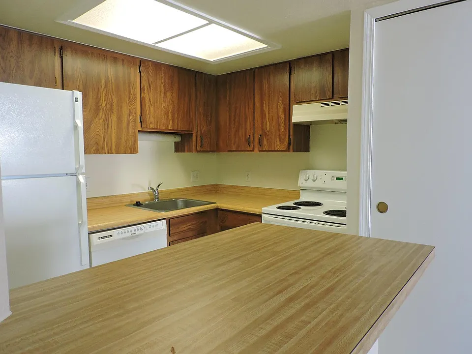 KITCHEN AND DOOR TO WASHER/DRYER